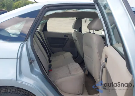 2009 Ford Focus Se z USA, uszkodzony, nr VIN 1FAHP35N79W229912